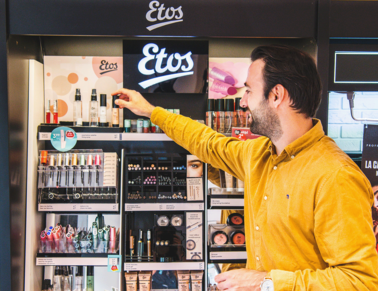 A man grabs makeup in the Etos store
